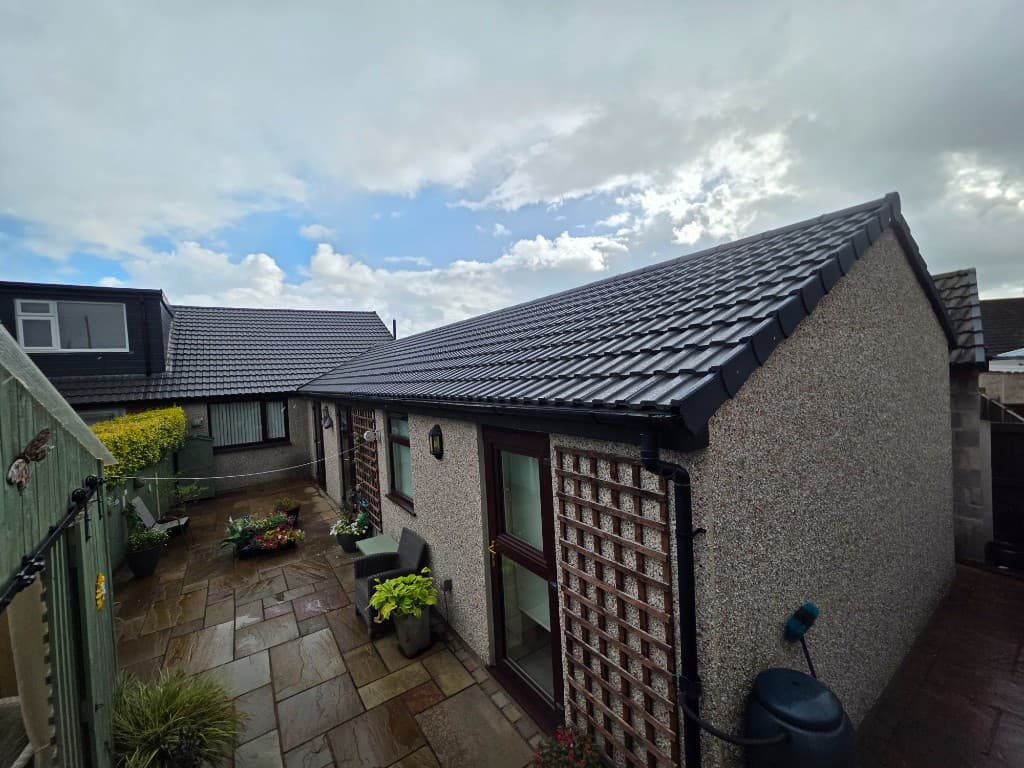 Outbuilding with new tiled roof